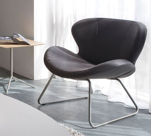 Peggy slide design fauteuil in leder met chromen sledeframe